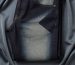 Industrial laser etches fade pattern onto indigo denim in bright clean factory setting